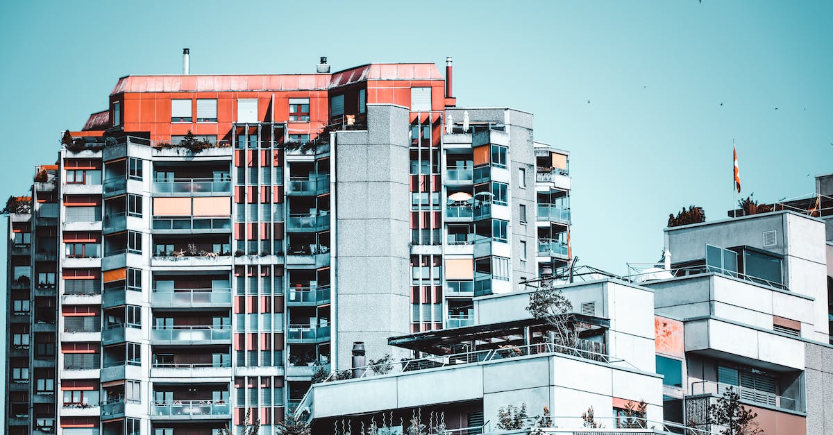 Low Angle Photography of White High-rise Building